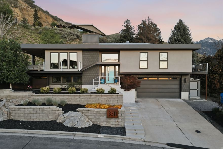The crown jewel of East Millcreek. Modern design, incredible views, a pool, spa, and a flat yard. A few of those things usually do not go together, and that is exactly what makes this property truly one of one. Situated on one of the best lots on the east side, this home offers a modern indoor-outdoor lifestyle that feels like something you would see in the Bird Streets of Los Angeles or another premier real estate destination. This 4-bedroom, 3-bathroom home features a grand kitchen island, open-concept living and dining, and mountain or valley views from just about every window in the home. Thoughtfully updated and built for even the pickiest of today's buyers, the home blends clean modern finishes with comfort, function, and unforgettable views. Outside is where the rarity really begins. A heated pool, spa hot tub, flat yard, gas fire pit, and built-in barbecue create an outdoor setting that is incredibly hard to find in Salt Lake City, especially in this location. Just minutes from grocery stores, restaurants, coffee shops, and everyday conveniences, this is one of the premier locations on the east side. You are roughly 35 minutes from major ski resorts including Snowbird, Park City, and more, while still being about 15 minutes from Salt Lake International Airport and downtown Salt Lake City. Welcome to a well-known property that likely will not hit the market again anytime soon.