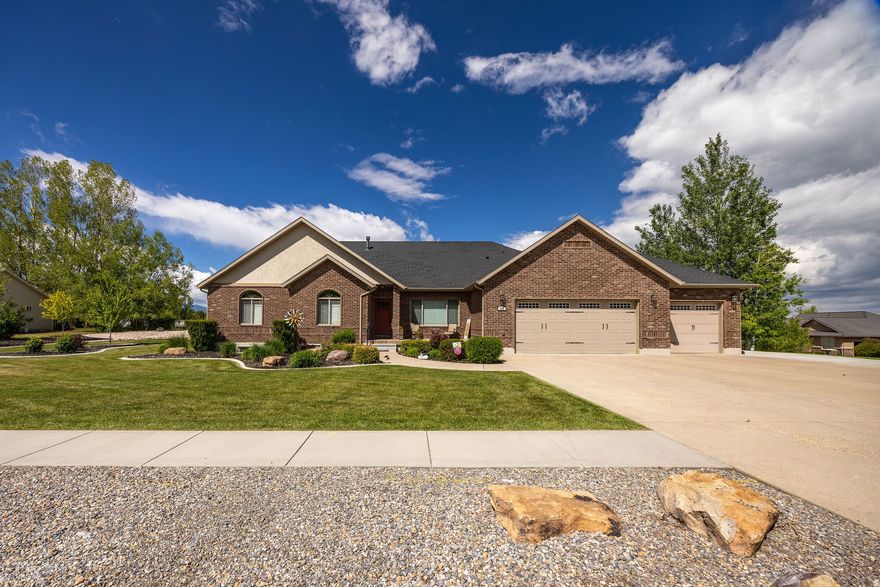 Beautiful views for days from the covered deck on a quiet street! This spacious home features 6 bdrms, 4.5 baths, and a 3-car garage on just over 1/2 acre. Plus full concrete pad for RV parking. Enjoy the large deck and covered patio.