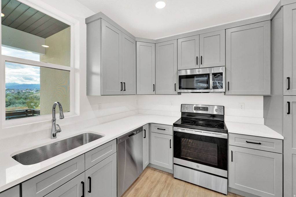 Photo of 717 W W COHO LN S #203 2F, Midvale, UT 84047 (MLS # 2160331)