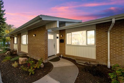 Photo of 862 E THREE FOUNTAINS DR #210, Murray, UT 84107 (MLS # 2122975)