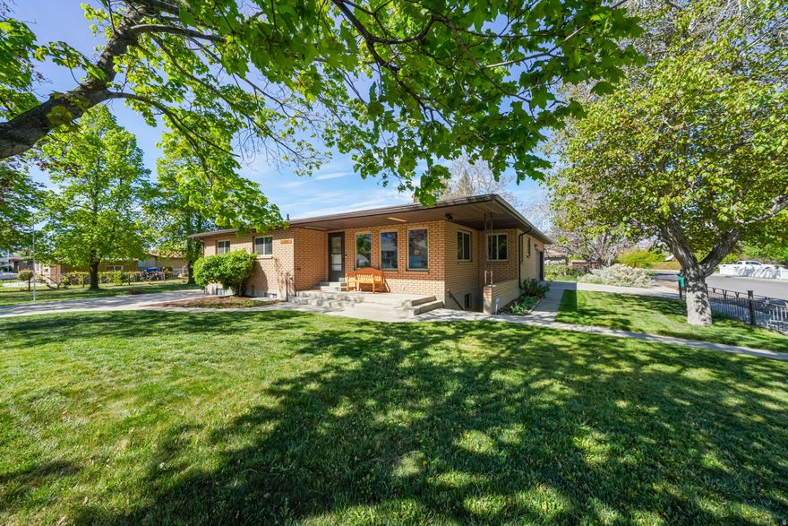 Versatile living at its finest in the heart of Orem! This fully updated home sits on an oversized .41-acre corner lot and offers incredible flexibility for any lifestyle. The main floor features a cozy sunroom to enjoy all year round, perfect for relaxing and unwinding. Need space for extended family, guests, or rental income? The private basement apartment features its own separate entrance and driveway, offering true independence from the main living area. The basement also boasts a large unfinished bonus space with unlimited potential, whether you envision a home gym, workshop, additional living space, or oversized storage. This home has room for it all, including proximity to local universities such as UVU and BYU. Parking is never an issue with a 1-car carport, an attached 2-car garage, and two driveways. Move in with confidence, with big ticket items such as a new roof (2023), updated plumbing, a new AC unit, and updated electrical panels already being addressed. Opportunities like this don't come along often. Schedule your showing today!