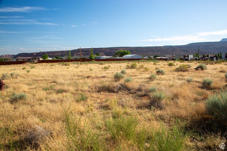 Commercial Development Opportunity  3.99 Acres in San Juan County, Just South of Moab!  Unlock the potential of this 3.99-acre parcel, offering endless commercial development opportunities. Whether you're envisioning your dream RV park, a new business venture, or expanding your current operations, this property provides a strong foundation with an existing 500 sq. ft (Office/Laundry/Restroom/Shower Building), and employee housing hookups already in place.  Located just south of Moab in San Juan County, this versatile property is perfectly positioned for growth. With ample space and flexible potential, the possibilities are wide open-RV park, lodging, service-based business, or recreation-focused enterprise-you decide.