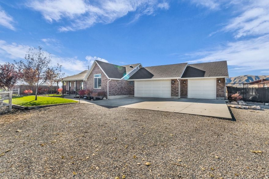 The home is fully remodeled in 2019 and beautifully finished, with a full mother-in-law apartment. Attached 3 car garage. Huge 32'x80' shop with air and heat with a 50'x50' barn attached. This property is being sold as potential commercial/industrial land. Zone changes happening on adjacent properties. UVU South campus is being built >1 mile. Maverick and commercial industrial complex recently built nearby. Currently in Ag protection, status will be released.