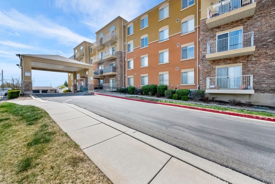 Welcome to this beautifully maintained and thoughtfully updated mid-level condo in the desirable Village at River's Edge community. This 2-bed 2-bath home features a spacious open floor plan, 9-foot ceilings and tons of natural light. In the kitchen you will find gorgeous granite countertops, stainless Steel appliances, and plenty of cabinet space. Large primary suite with walk-in coset and double vanity. New light fixtures throughout and a private balcony. This unit even comes with an extra storage room. Enjoy year-round ease and comfort with your own heated garage space. This secure, elevator-access building offers single-level living with wide hallway and no-step entry. Perfectly situated by freeway access, shopping and restaurants, this move-in ready condo offers convenient, low-maintenance living in the prime location!