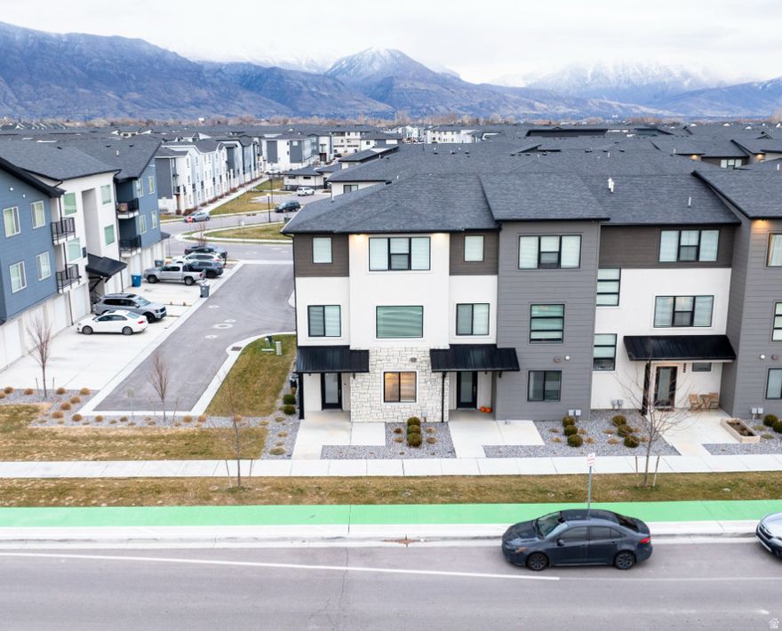 Beautiful end-unit townhome with attached 2-car garage. 1st floor features bedroom & full bath. 2nd floor offers bright, open living with kitchen & dining. 3rd floor includes owner's suite, 2 additional bedrooms, full bath & laundry. 9ft ceilings.