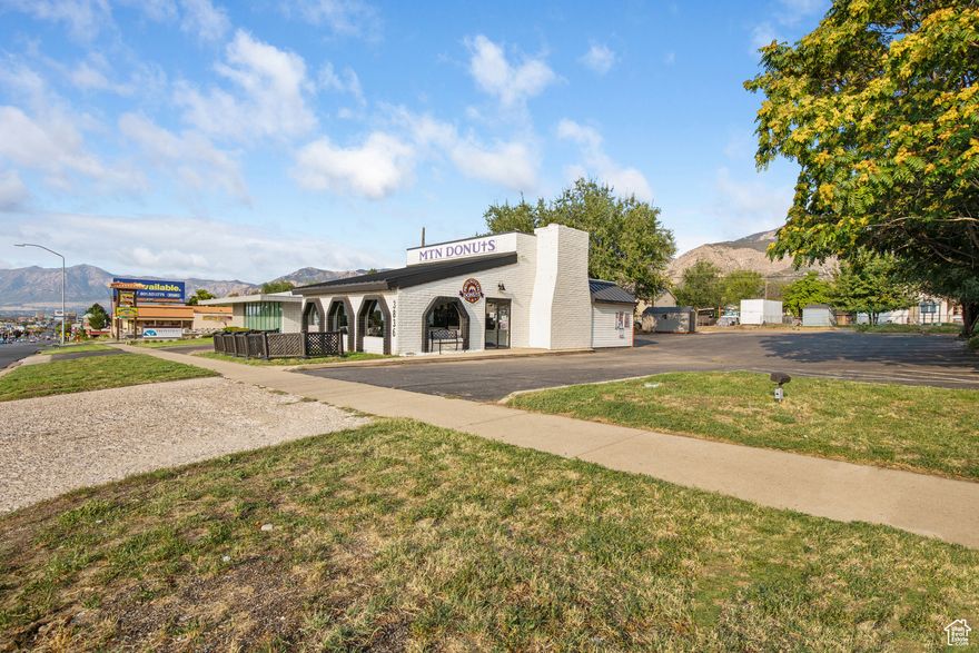 This is a rare chance to own, lease or lease to own a commercial property in a thriving Northern Utah Location 4 OPTIONS-on this property: 1) BUY THE BUILDING 2) LEASE TO OWN BUILDING 3) LEASE THE SPACE 4) AND/OR We're TAKING OFFERS on buying the existing business, Mountain Donuts, which includes all equipment making it a TURN KEY successful, award-winning Business with FREE TRAINING included-Make Money on day one ADDITIONAL DEALS AND INCENTIVES Seller is offering $10,000 in closing costs when purchasing the building HIGH LIGHTS-FEATURES AND BENEFITS Prime Location High Traffic Corridor Excellent Visibility Customer Ready Drive-Thru window (rare in this area) Two New Commercial A/C units 2018 POS System with 2 cash drawers and an extra hand held for drive-thru Large Shed/Storage 2023 Large Parking lot with 17 spaces and a handicap spot NEW 50 Year metal roof 2018 NEW 10 Year Membrane Roof in back half of building 2025 NEW Water heater 2025 ADP Security System Ready for your next concept or tenant Close to Hospitals, Weber State University, and many new apartment complexes, Close to Costco, Trader Joes, McDonalds and more Fast Growing Area Fresh Paint and professionally cleaned-ready to hit the ground running Turn Key set up Furnished Lobby Separate Check out area Beverage/Coffee Station Outdoor fenced in Patio with seating Own a 1,500 sq.ft. commercial property with drive-thru. This move in ready space is ideal for an owner operator or investor looking for a high visibility property in one of Ogden's busiest corridors. Don't miss this!