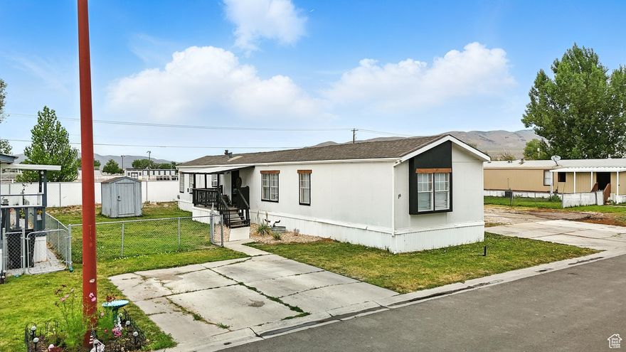 Affordable housing in Tremonton is hard to find, and this updated 3-bedroom, 2-bath home in Town & Country Estates is ready for you. Featuring new flooring in most areas, updated bathroom plumbing, a new kitchen sink, and all appliances included (washer & dryer too), this home offers excellent value. Enjoy a fully fenced yard-perfect for pets and kids-plus double parking and an included storage shed for your extras. Situated in a well-kept community with its own park and a central Tremonton location, you're just minutes from schools, shopping, and everyday conveniences. Whether you're a first-time buyer, downsizing, or simply seeking a low-maintenance lifestyle, this home delivers comfort and affordability in one package. Pre-approval with the HOA is required and must be submitted with offers. Hoa fee $685 month. Buyer to verify all information.