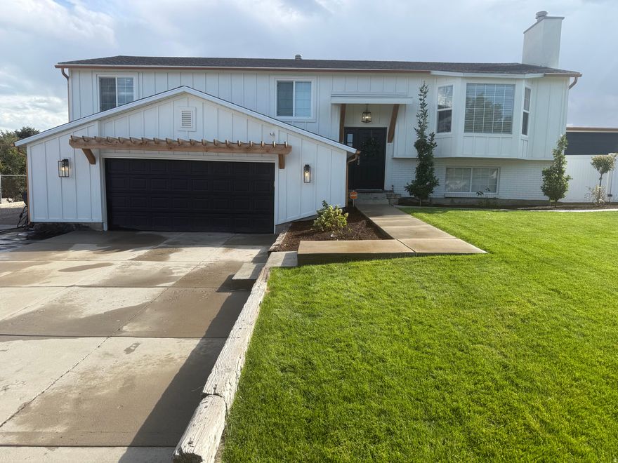 Completely remodeled inside and out - and the largest backyard ever!  One step inside and you will appreciate the attention to detail.  With 5 bedrooms, 3 bathrooms AND one acre of playground bliss, you will have room for everyone and everything!  Enjoy the extra large primary master closet, the wide open family room and kitchen area, the expansive deck, the oversized Bullfrog hot tub, the buried rectangle trampoline, the powered container workout room, the 2 extra garages, the massive soccer, baseball or football field, bicycle/dirt bike track, cheap pressurized irrigation water, the cement basketball/pickleball court, and tons of RV parking!  Horse property! Check out the tour then schedule a time to see this gem!