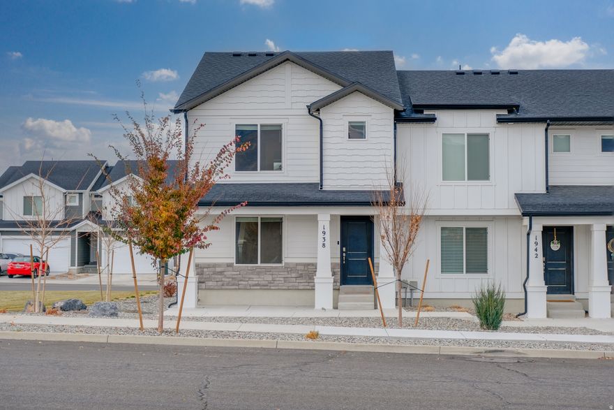 Rare End Unit with Grass in Tooele's Fastest-Growing Area! This Dalton Floorplan Townhome Stands Out With the Attached 2-Car Garage With Epoxy Floor and Ample Extra Street Parking In Front. A Six-Foot Crawl Space for Storage, a Man Cave, or Whatever Your Heart's Desire. Enjoy Beautiful Views of the Oquirrh Mountains from the Open-Concept Main Floor, Perfect for Everyday Living and Entertaining. Upstairs Features Three Bedrooms, Including a Primary Suite with a Private Bath and Walk-in Closet, Plus a Second Full Bath and Convenient Laundry Room. Located Minutes from Deseret Peak High School, Deseret Peak Temple, and Major Shopping and Dining. You'll be Close to Smith's Marketplace at The Peak at Compass Point and the Expanding Founders Pointe Center with Hobby Lobby, Five Below, Chipotle, Chili's, and More Stores on the Way. Convenience, Views, and Modern Living-All In One Place.