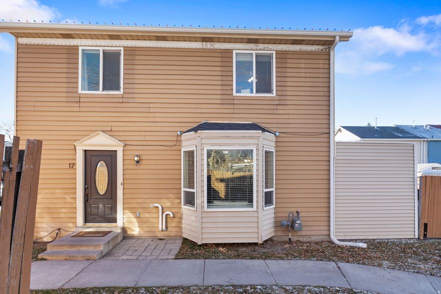 Thoughtfully updated Lehi townhome in a prime, central location. This bright and open floor plan features an updated kitchen with granite countertops and a charming wood beam accent that adds character and warmth. Fresh paint throughout, an updated bathroom, and a new roof and gutters offer both style and peace of mind. This home includes 3 bedrooms, 1.5 bathrooms, and a fully fenced private yard, a rare find for a townhome and ideal for relaxing or entertaining. Whether you're searching for a first home or a smart investment opportunity, this property checks all the boxes. Residents enjoy access to HOA amenities, including a large grassy common area just beyond the backyard, a playground, and a picnic area. The HOA also covers front yard and common area maintenance, landscaping, snow removal, and garbage, making for easy, low-maintenance living. Conveniently located near I-15, Thanksgiving Point, Traverse Mountain Outlets, Pioneer Crossing, and within walking distance to the Lehi City Library and Legacy Center Community Center, complete with a gym and pool. Buyer and Buyer's Agent to verify all information, including square footage.