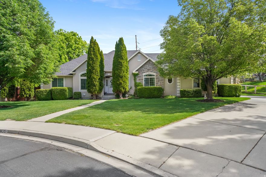 Move in ready home in highly desired neighborhood at the end of a  cul-de-sac offering large open spaces inside and out with amazing unobstructed views of  Mount Timpanogos!   Discover the perfect blend of space, luxury, and serenity in this beautiful two-story home with a full fully finished basement.  Situated on a generous .46-acre lot, this property offers a rare sense of privacy with open space, mature trees no backyard neighbors and a breathtaking, unobstructed view of Mount Timpanogos!  Interior highlights feature spanning three fully finished levels, the home has a thoughtful layout designed for both entertaining and comfortable daily living. Recent upgrades include triple pane windows, roof,  kitchen, paint with brand-new carpet throughout helping to ensure a modern stress free move in ready experience.   Main Level: Has a specious primary suite with a separate walk-in-shower & tub. The heart of the home has an updated chef's kitchen with ample countertop space and cabinets, enjoy the formal dining room for special gathering and holidays or the dinette for a more casual dining. Also on the main level is a living room, two bedrooms, full bathroom and laundry room.   Upper Level Get Away: The second story has a private oversized bedroom or office with plenty of natural light and personal half bath.   Basement: The fully finished basement is an entertainer's dream, featuring another large family room, theater room, bonus room, spacious storage room, two bedrooms and a full bathroom.  Exterior & Property Features: The outdoor living space is a true sanctuary. The expansive backyard is framed by mature trees and lush landscaping, giving you privacy and a place to relax or stretch your legs. Enjoy the open pasture behind you with friendly horses. Also included is a playhouse, hot tub, garden and storage shed. The extra long driveway provides extra parking for additional cars, RV's and toys.