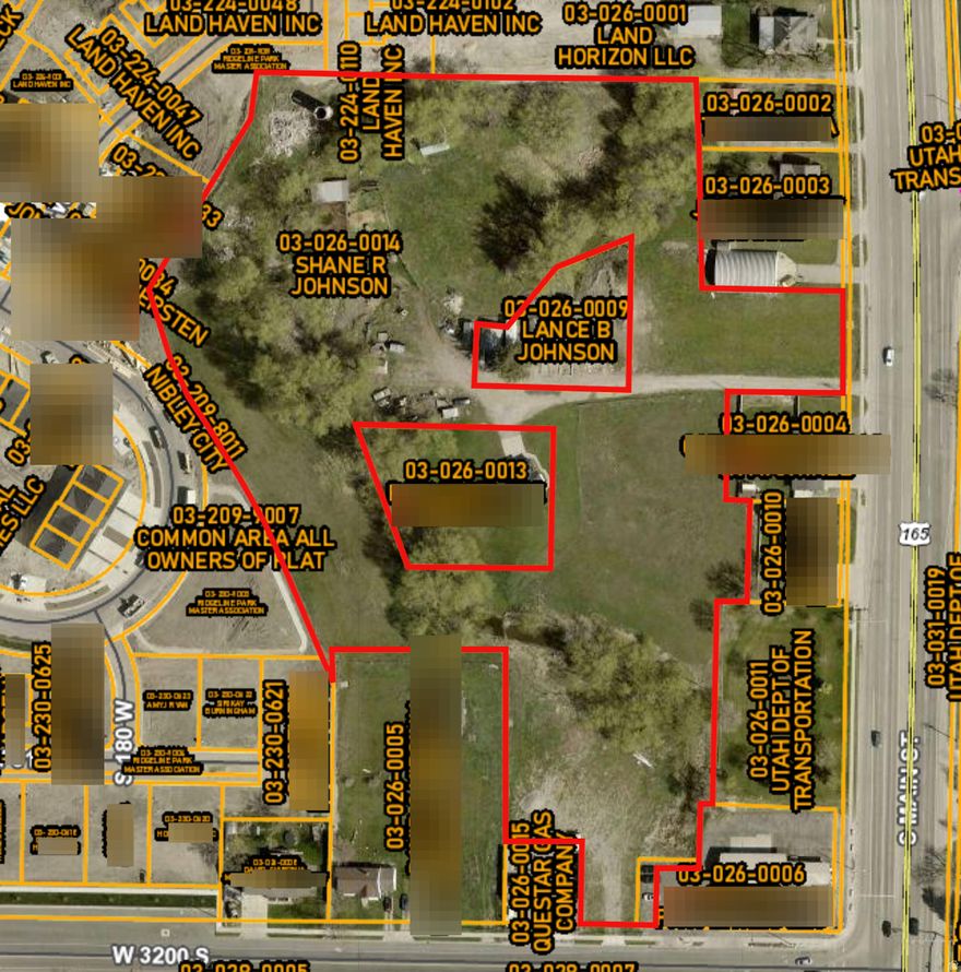 includes parcels 03-026-0014 and 03-026-0009. Does NOT include 03-026-0013. Property is currently zoned commercial. Frontage form Main street as well as 3200 south. Agent owned. Great potential for development.