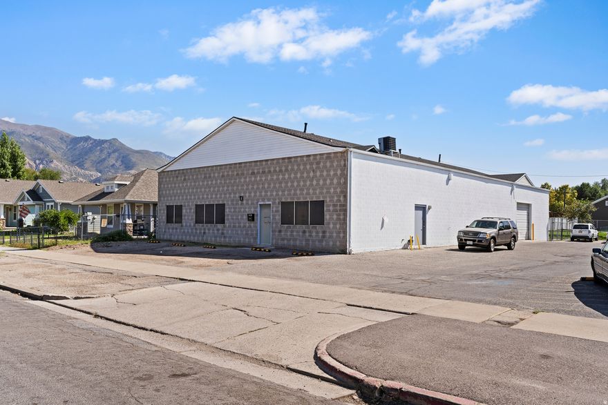 Industrial flex space offering 5,000 square feet in central Ogden with direct access to major roads and freeway systems. The property combines 750 SF of office space with 4,250 SF of warehouse/production area, available for immediate occupancy. Key features include an 8' x 10' overhead door for loading operations, single-phase power, and attic storage that adds usable space without increasing your footprint. Secure yard space provides additional room for equipment staging, fleet parking, or outdoor storage. The property's R-MFV zoning supports various permitted uses. Located in Ogden's commercial core, this property provides straightforward access to major transportation corridors while maintaining proximity to the city's business districts. The combination of office and warehouse space suits distribution operations, light manufacturing, contractor businesses, or service companies requiring both administrative and operational facilities. Ogden City HUBZone certified.