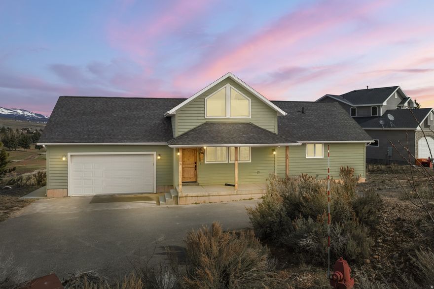 PRICE REDUCTION on this Stunning 6-bedroom, 3-bathroom home offering 3,640 square feet. Situated adjacent tovSweetwater Golf Course with breathtaking views of Bear Lake and the surrounding mountain ranges. This turnkey property comes fully furnished and is currently set up to sleep 31 guests, making it an ideal investment for short-term rentals or a spacious private retreat. Inside, guests will love the shuffleboard, hockey table, foosball, and skeeball, providing endless indoor entertainment. Designed for both comfort and entertainment, the home features expansive windows and sliding glass doors that showcase the stunning scenery while filling the interior with natural light. Outside, the property offers a firepit and playground. With its prime golf course location, modern amenities, and ready-to-rent setup, this home is a rare opportunity to own a highly desirable Bear Lake retreat. Whether you're looking for a personal getaway or an income-generating property, this home delivers the ultimate in comfort, recreation, and scenic beauty. Buyer to verify Square Footage; Numbers provided by the Seller.