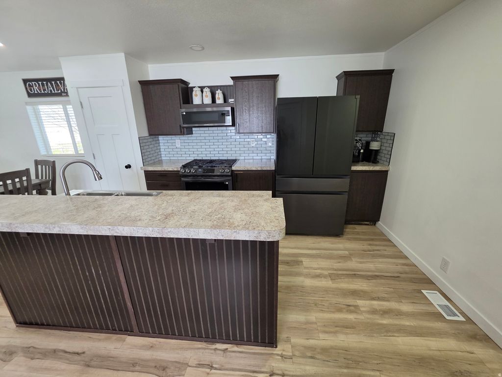 Photo of 215 ENGSTROM Way, Layton, UT 84041 (MLS # 2144981)