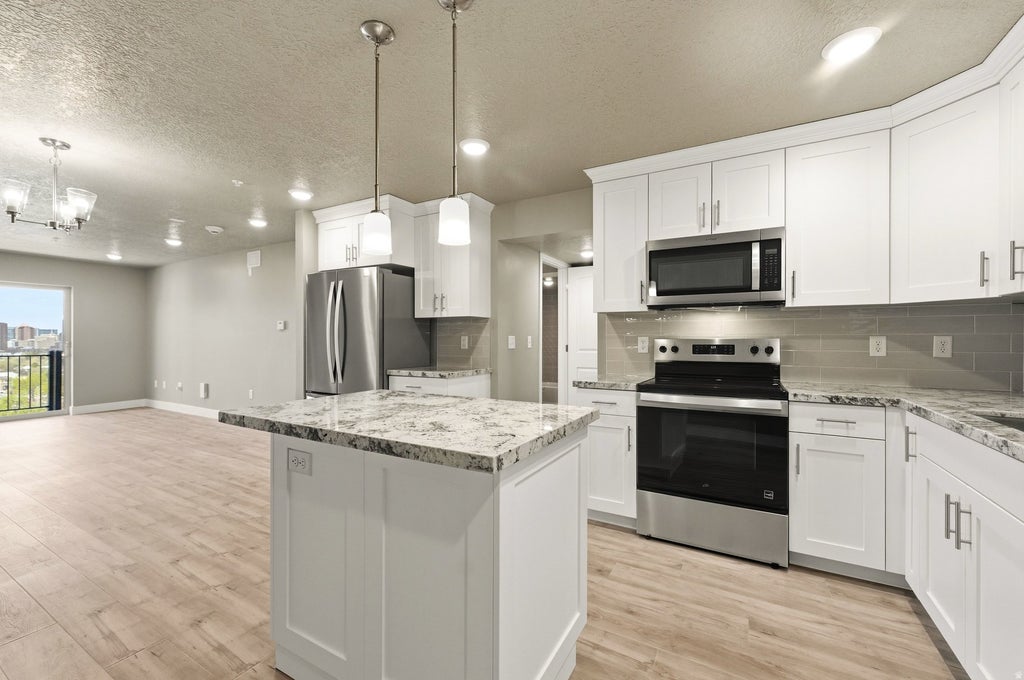 Photo of 1032 E 400 S #301B, Salt Lake City, UT 84102 (MLS # 2163332)