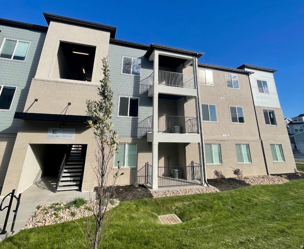 Photo of 13536 S POOLE DR W #E302, Riverton, UT 84096 (MLS # 2141730)