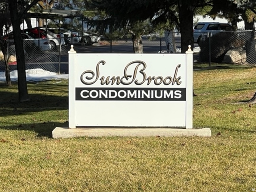 SunBrook Condominiums signage with decorative finials