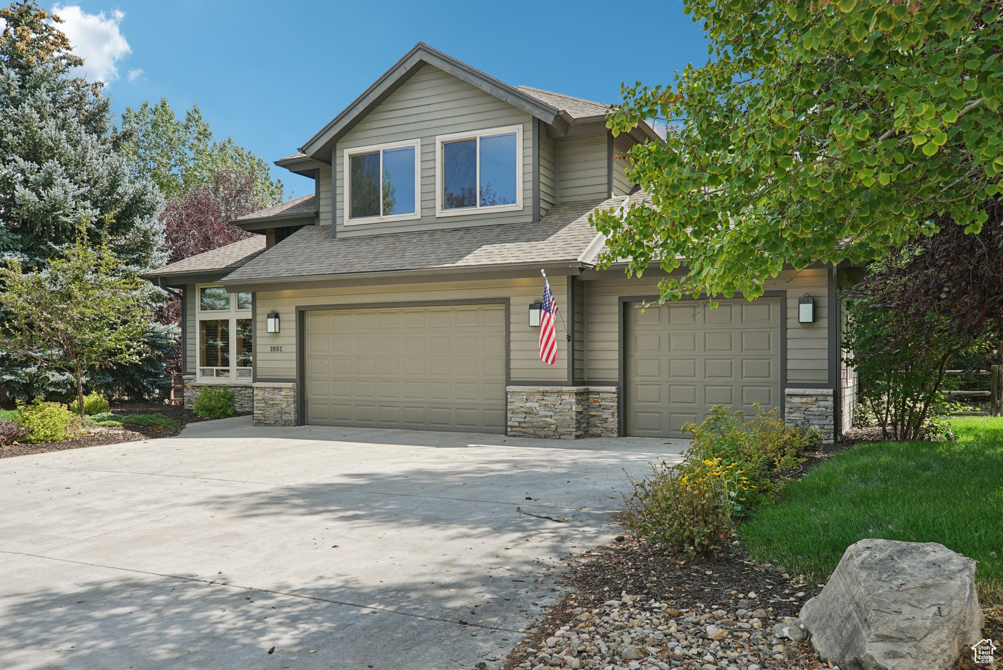 Nestled on a serene .29-acre homesite in the coveted Ranch Place subdivision of Park City, Utah, this charming residence at 1051 Cutter Lane seamlessly blends tranquility with unmatched convenience. Backing directly to the scenic Ranch Place Trail System, the home invites you to embrace the outdoors with immediate access to hiking and biking trails. The expansive backyard is an entertainer's dream, boasting a large patio, a cozy firepit, and a luxurious hot tub, all framed by breathtaking natural views that create a private oasis. The master bedroom, complete with large windows and a private deck, overlooks this peaceful backyard, offering a daily retreat into nature's embrace. Inside, the home exudes warmth and style with an open layout perfect for both relaxed living and hosting gatherings. Its prime location places you just steps from vibrant dining, boutique shopping, charming local coffee shops, a convenient bus route, and a welcoming neighborhood park. Only minutes from the bustling Kimball Junction and the historic charm of Main Street Park City, this home also offers an easy commute to Salt Lake City, making it ideal for both full-time residents and those seeking a mountain getaway. Don't miss your chance to own a slice of Park City's coveted lifestyle, where space, sophistication, and an unbeatable location converge. Schedule your private showing today and discover why 1051 Cutter Lane is the perfect place to call home!