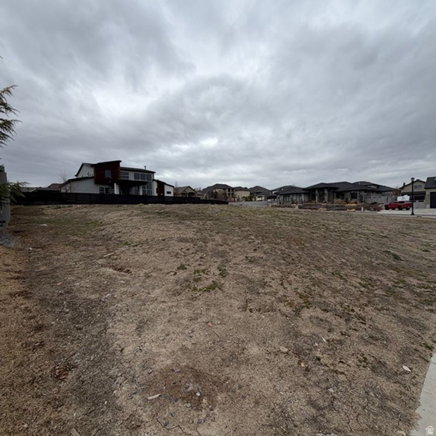 Build-ready .35-acre corner lot in sought-after South Jordan! Rare vacant land opportunity in an established, developed neighborhood-.35 acres on a corner with great visibility and flexibility for your future build. Enjoy quick access to shopping, dining, parks, and commuter routes, all in one of the valley's most desirable cities.  Vacant lots like this don't pop up often-especially in South Jordan. Reach out to South Jordan for  zoning/utility details and the best way to make it yours.