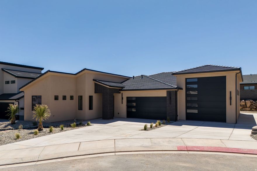 Welcome to this beautifully maintained home in the desirable Scenic Pointe subdivision of Hurricane, Utah-offering the perfect blend of comfort, functionality, and Southern Utah lifestyle.  This 3-bedroom, 3-bathroom home features 1,816 square feet of thoughtfully designed living space with quality finishes throughout. The interior showcases engineered hardwood flooring, quartz countertops, and upgraded LG appliances, creating a clean, modern feel that's both stylish and durable. The open layout is ideal for everyday living and entertaining, with plenty of natural light and a seamless flow between the kitchen, dining, and living areas.  One of the standout features of this property is the impressive RV garage-measuring just under 41 feet deep and equipped with an extra-wide and tall door, making it perfect for storing larger vehicles, boats, or recreational toys. In addition, there is small trailer parking along the side of the home, providing even more flexibility for your storage needs.  Situated on a .19-acre lot with no HOA, the property offers both freedom and space. The fully enclosed backyard is designed for low maintenance with turf and rock landscaping, allowing you to enjoy the outdoor space without the upkeep.  Located just minutes from some of Southern Utah's most sought-after recreation, including Sand Hollow Reservoir, scenic hiking and biking trails, and Zion National Park, this home is perfectly positioned for adventure and everyday convenience.  Whether you're looking for a primary residence, vacation home, or investment opportunity, this property offers exceptional value in a prime Hurricane location.   * Use our preferred lender and receive 1% of the loan amount in incentives *   All information in this listing is deemed reliable but not guaranteed; buyer or buyer's agent to verify all information to their satisfaction.