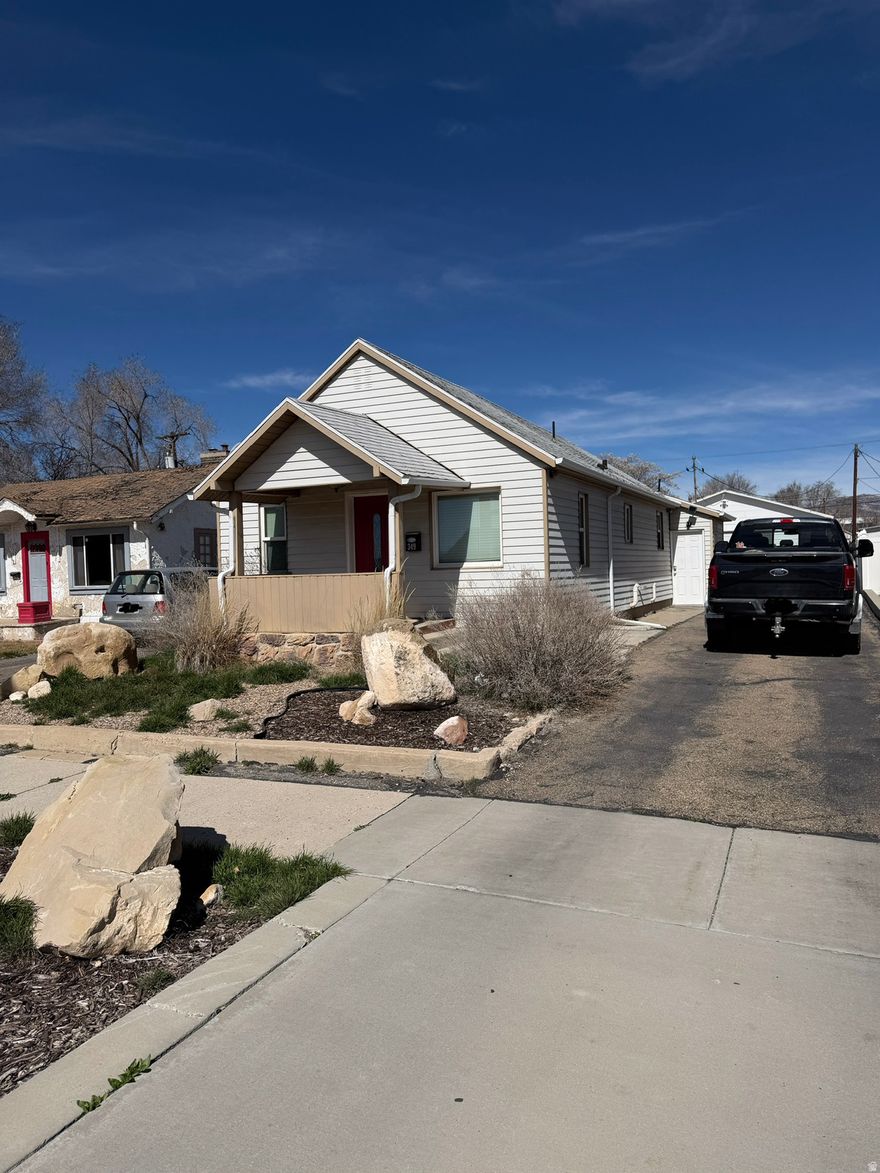 Step back in time with this charming 1920s bungalow located at 349 W 200 S in Carbon County. Offered at $290,000, this single-family residence provides 1,101 square feet of comfortable living space featuring two bedrooms and one bathroom. The interior boasts a blend of classic character and modern updates, including an updated kitchen, laminate and tile flooring, and the convenience of single-level living. Energy efficiency is prioritized with double-pane windows, central electric air conditioning, and a forced-air heating system.The property sits on a 0.20-acre lot that is fully fenced and features a detached two-car garage with extra length for added storage or workshop space. Additional outdoor amenities include a storage shed and a convenient secondary entrance via the partial basement. Located within the Carbon School District, the home is close to Castle Heights Elementary and Carbon High School. With no HOA fees and a prime location, this well-maintained cottage is ready for its next owner.