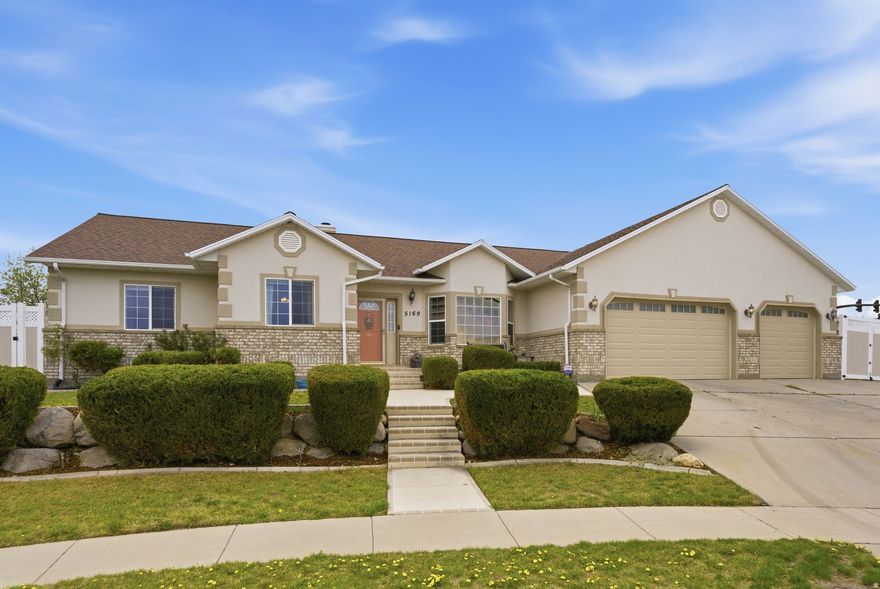 Welcome to this beautiful custom rambler with an expansive open floor plan and chef-ready kitchen, granite countertops, high-end cabinetry and vaulted ceilings that flows directly to your own custom built-in  outdoor kitchen with grill, granite countertops fully covered with lighted Pergola built in 2017. The main level offers a generous family room plus two spacious bedrooms including a serene primary suite. The finished basement is an entertainer's dream with kitchenette, large theater room, three sizable bedrooms and abundant storage. Practical luxury throughout with meticulous owner care and recent major updates including: roof 2024, water heater 2025, HVAC 2025, range and microwave 2026, upstairs paint 2024,  basement kitchenette update including paint, carpet, cabinets and fridge in 2019 and multicolored Jellyfish lighting in 2021. Extra conveniences include a spacious  3 car garage and plenty of RV parking. Impeccable condition and move-in ready. This is truly a must see! Buyer and buyer agent to verify