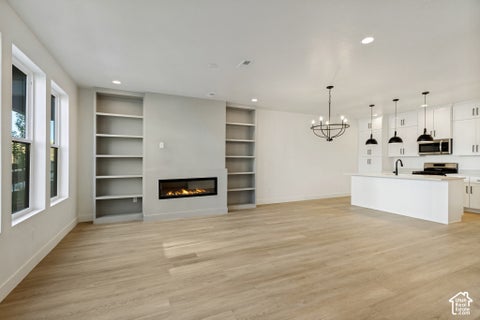 Photo of 6958 W HIDDEN HILLS WAY S #312, West Jordan, UT 84081 (MLS # 2191752)