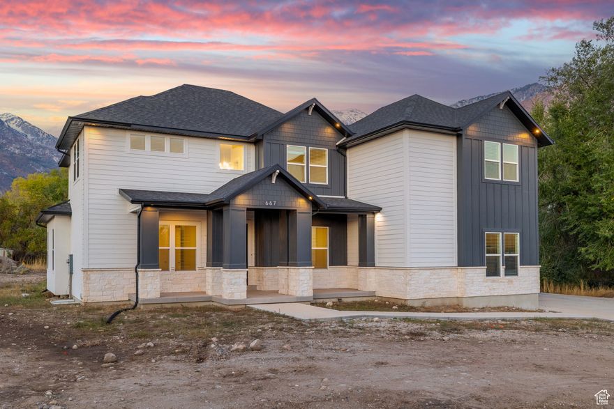 Located on a quiet Alpine street, this custom-built 6,200+ sq. ft. home offers luxury living surrounded by mature trees, a stream, and mountain views. The main floor includes a primary suite, guest bedroom, office, mudroom, and laundry on every level. Upstairs features 4 bedrooms, a Jack-and-Jill bath, another full bath, and a bonus room over the garage. The walk-out basement offers space for 2 more bedrooms plus a 2-bedroom accessory apartment with its own entrance, laundry, and parking. The unfinished yard provides a blank canvas to design your dream outdoor space. A rare Alpine find combining space, flexibility, and natural beauty.