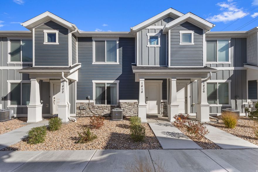 Impeccably clean, stylish 3 bd, 2 bath townhome in Spanish Fork's desirable, Quiet Valley Community. Built in 2024, this home shows like brand new! Enjoy open concept living, including a gorgeous modern kitchen with a gas range and walk-in pantry! Large Primary Suite includes walk-in closet and ensuite bathroom. This home boasts GORGEOUS mountain views from bedroom windows and includes bedroom level laundry! This community has it all, from a beach-entry pool, pickleball courts (literally a one-minute walk!), pump track to playgrounds and walking trails. If convenience is important, this home is for you! It is centrally located near restaurants, Walmart, a movie theater, shopping and less than 10 minutes from I-15. Storage can be an issue in some townhomes; however, this home is very different! It includes an 8' high crawl space and an attached two car garage!  You have to see it to believe it!!!! Measurements provided as a courtesy only, buyer to verify all info.