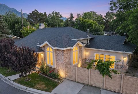 Photo of 1522 E AMBLEWOOD LN, Millcreek, UT 84124 (MLS # 2147624)