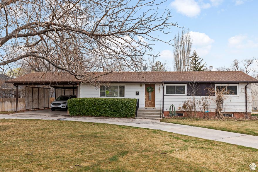 Comfy family home on a large corner lot, close to schools, lots of parking.  5 bedrooms, 3 baths, living room, family room, included appliances and washer/dryer.