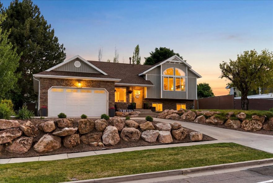Located close to shopping, dining, I-15, Highway 89 & Weber State, this home is in a prime location to be close to all of your needs while still feeling quiet and quaint in a great neighborhood! This 5 bedroom, 3 bathroom home is packed with so many upgrades. Recessed lighting throughout, updated lights and fixtures, vaulted ceilings, slow close cabinets, a large island, extra tall shaker cabinets, granite countertops, a farmhouse sink, stainless-steel appliances, central vac, window shades and more! Decorators or readers will enjoy all of the many built in's all throughout the home. This home features a full in home theater, equipped with a new surround sound system, projector, terraced seating and dimmed sconce lighting for all of your perfect movie nights in. Outside you'll enjoy the well-maintained yard with a private deck off of the master bedroom, playground, sand box, garden box, peach and plum fruit trees. This home is truly one of a kind, located in the heart of Riverdale. Come see it for yourself in person!