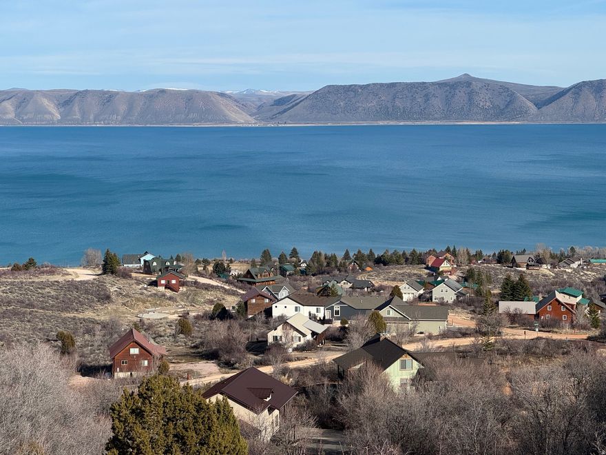 Beautifully half acre lot in Bear Lake West with with BEACH ACCESS and incredible views of Bear Lake, surrounding mountains and valley.  Year round access, Cooper's Restaurant and Sports Bar, seasonal heated pool, year round hot tub, Bear Lake West golf course, tennis and pickleball courts.