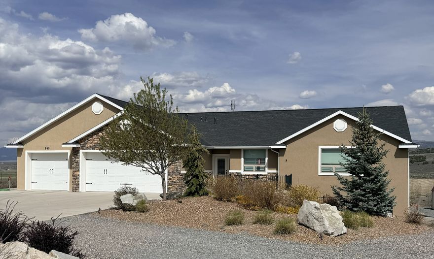 Perched above the town of Panguitch, this stunning property offers  360 degree views, abundant open space, and generous acreage. The custom home is complemented by a large detached garage and workshop- perfect for hobbies, storage, or creative pursuits.