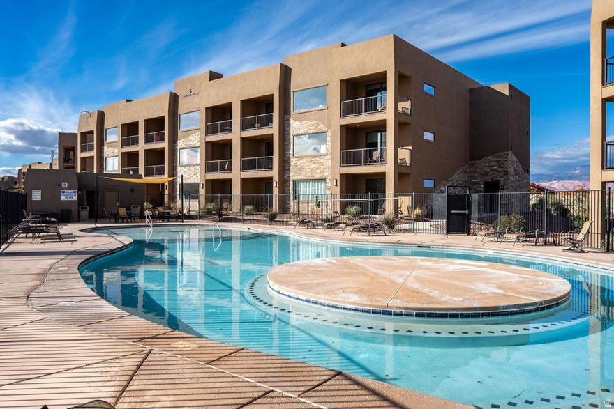 This new 2 bedroom condo meets the needs of golfers, tourist & those needing a break from the winter cold or busy pace of life. It can also be used to generate revenue from nightly rentals. There's an elevator to this 3rd floor unit overlooking the largest of 4 community pools, golf course & the scenic Southern Utah desert. Spacious great room for entertaining connecting to open kitchen & dining.