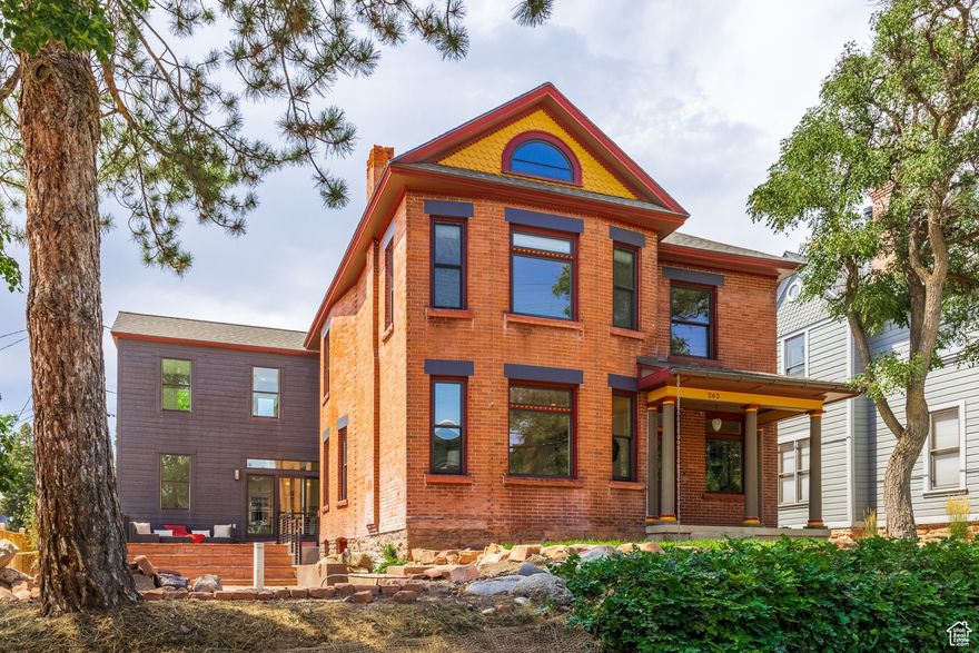 The best of both worlds - Completely renovated brick Victorian with new approximately 2,000 SF addition complementing the old with the new. This expertly designed remodel offers a brand-new chef's kitchen, primary bedroom/bathroom with a walk-in closet, and entertainment room in the new addition, east wing of the house. Extensive care has been taken to refurbish this home's original wood details and hardware while updating the original plaster and lath walls to new drywall; all original electrical and plumbing have also been updated throughout the house. The new addition seamlessly integrates the old with the new by matching all of the beautiful  baseboards and window casings and five panel doors and hardware - sneak views of exposed brick at key transitions pay homage to the original Victorian brick. Outdoor patio and deck offer plenty of space to enjoy the full value of this property. Perfectly situated 2 blocks from Smiths Grocery, Straws market, City Creek Park and a half block to pickleball courts, this home's location is conveniently quick access to SLC downtown, LDS hospital, and Univ. of Utah. There is additional privacy for this home given the distance and low orientation of the neighboring homes to the south and west. Views of Mount Olympus range and Cathedral of the Madeleine can be enjoyed from multiple windows throughout the house. A rare 2-car plus garage has also been added to the property making this home a must-see for its overall size, new construction, and location in The Avenues.
