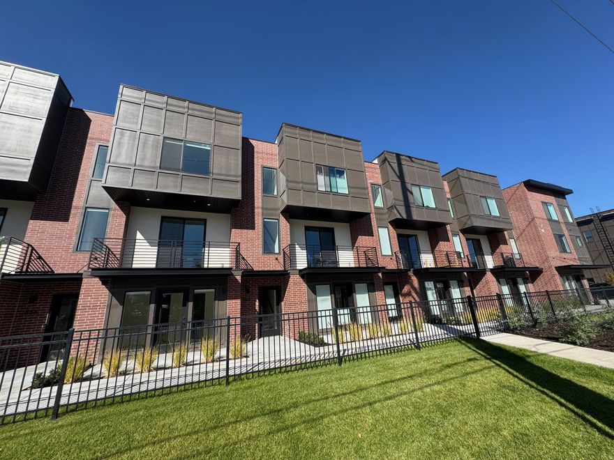 Welcome to theMonroe Unit 20, a stylish 2-bedroom modern townhome offering exceptional finishes, contemporary design, and the flexibility to comfortably work from home. Enjoy 9' ceilings, designer-curated lighting, LVT flooring in main living areas, and plush wall-to-wall carpeting in the bedrooms. The kitchen features quartz countertops, 42" upper cabinets, stainless steel appliances-including a slide-in range and refrigerator-and a sleek stainless undermount sink. Bathrooms include quartz countertops, square undermount sinks, elongated toilets, and a Euro-glass shower in the primary suite. Additional upgrades include recessed can lighting, black interior hardware, and light-filtering window coverings throughout. This vibrant community is unveiling brand-new amenities this summer, including a pickleball court. Ideally situated in South Salt Lake's growing urban scene, you'll enjoy quick access to shopping, dining, entertainment, and outdoor recreation. Plus-ask about qualifying for Zions Bank's CRA loan program, which may offer advantageous financing opportunities for this area. Don't miss the chance to own at theMonroe, where modern finishes, convenience, and lifestyle come together-along with the perfect setup for working from home. Ready to see it for yourself? Call today to schedule your private tour. Ask about our lender incentives!