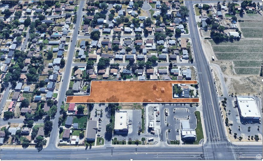 Incredible development opportunity in West Valley City! 2.34-acre site (2 parcels) zoned Residential Business with drive-through access from 4100 S to Janette Ave. Ideal for office use or potential multifamily (22-unit duplex concept with RM rezone-buyer to verify). Conceptual site plans are available. Close to major retailers, schools, and just minutes from Mountain View Corridor, SR-201, and I-215. High visibility and great access.   Contact agent for details and renderings. Buyer to verify all info, including zoning, development potential, and utility availability.