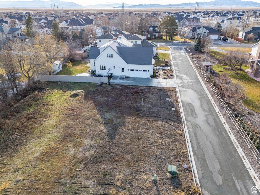 Build Your Dream Home in the Heart of Kaysville! This prime .32-acre lot at 1845 Sherri Lane offers an exceptional opportunity to create your dream home on a private lane in a quiet, serene setting with stunning mountain views (The .32 acres includes private lane; actual lot size is approx. .24 acres). The lot is flat and easy to build on, with utilities already stubbed, making the construction process even smoother. With the possibility of adding a basement, you have the flexibility to design the perfect layout for your needs. You are welcome to bring your own builder or partner with our trusted builder, who brings over 20 years of experience.  Don't miss your chance to secure this incredible property and build the home you've always dreamed of. Please submit all offers with a pre-approval letter.  Use your own lender or contact our preferred lender.