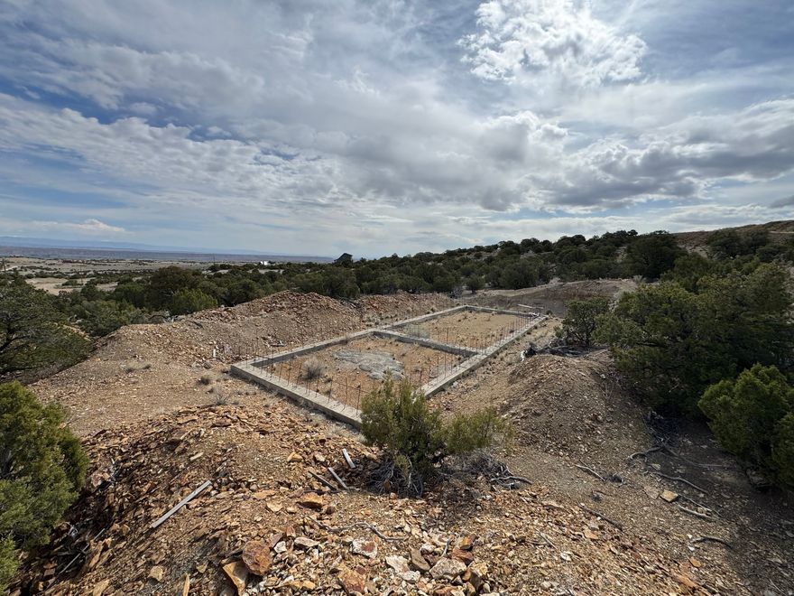PRICE REDUCED Check out this great lot in the Utah Mini Ranches!  This lot stands out from the rest, there is already concrete footings in place! Save money on excavation and concrete! Dimensions of the footings are approximately 25'x70' so about a 1,750sqft home. Make the drive and come and see it! Buyer to verify all information.