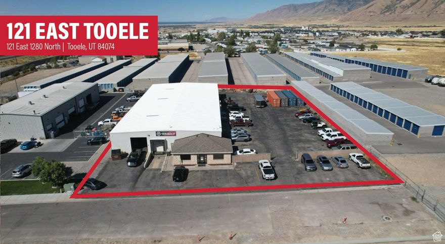 Total: 13,916 SF - Office: 1,604 SF - Warehouse: 12,312 SF  Fully Fenced with Razor Wire  Fully Paved with Asphalt  Clear Height: 14'  Two (2) 12'x12' Automatic Grade Level Doors  One (1) 9'x9' Dock High Door w Edge of Dock Leveler  Power: 800 Amp | 208V | 3-Phase | 4 Wire  Oil Water Separator  Gas Forced Heat  HVAC in Warehouse  Ceiling Fans in Warehouse  LED Lighting  Tool Room  Power Drops Throughout Warehouse  Compressed Airlines Throughout Warehouse  Trench Drains throughout warehouse  Warehouse Restroom  Reception Area  4 private Offices.  Restroom  Conference/Break Area  Security Cameras  Construction Type: Block and Metal Construction  Year Built: 1979  Acreage: 1.13 Acres  Zoning: (LI) Light Industrial  Access: Quick Access off of Main Street  Location: Tooele City is About 35 Miles Southwest of Downtown Salt Lake City and 30 Miles to SLC International via I-80/ SR-36, Offering Quick Regional Access and a Pro-Business Climate. With 41,000 Residents and Ongoing UDOT Upgrades to SR-36/I-80 Improving Mobility, the Market Draws Workforce and Customers From Both Tooele and Salt Lake Counties.