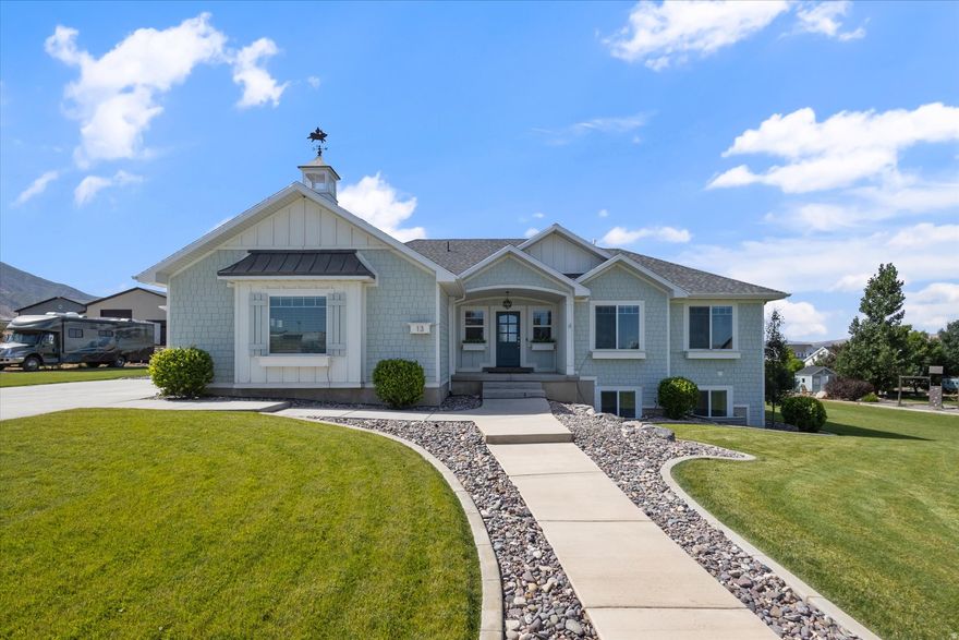 Designer living on over an acre! This stunning custom home blends high-end design with everyday comfort. The open-concept layout features vaulted ceilings and a chef's kitchen with double ovens, pot filler, hidden spice racks, and a large island perfect for entertaining. The main suite offers a jetted tub, custom lighting, and a laundry-ready walk-in closet. Downstairs includes a home theater, wood-burning stove, kitchenette, game space, and ample storage. Outside enjoy a deck with privacy shades, 3-car garage, insulated workshop, chicken coop, garden, trampoline, basketball court, and RV parking. Located in a quiet 7-home HOA with shared well ($50/month) and private septic. Don't miss this incredible setup schedule a showing today!