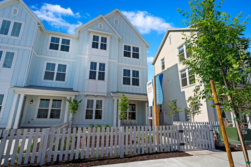 UNDER CONSTRUCTION. This beautiful townhome is just a short walk from Daybreaks Watercourse! This thoughtfully designed end unit townhome offers flexible living with plenty of space for entertaining. Featuring an open-concept layout, the home includes a large kitchen with 2 oversized islands and a large 19ft x 17ft family room with 10ft ceilings, perfect for hosting family and friends. A spacious covered deck extends off the kitchen, ideal for outdoor dining and relaxation. There is an unfinished room on the main level that can easily be finished as a 4th bedroom and full bath. This home has just started framing and is scheduled to be completed end of September. Fully fenced in yard with a lawn that is fully maintained! This home is the same floor plan as our model home - schedule your tour today!