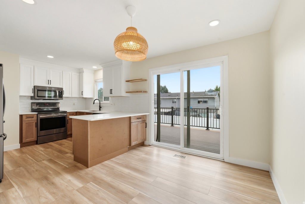 Photo of 666 W 725 N, Clearfield, UT 84015 (MLS # 2175688)