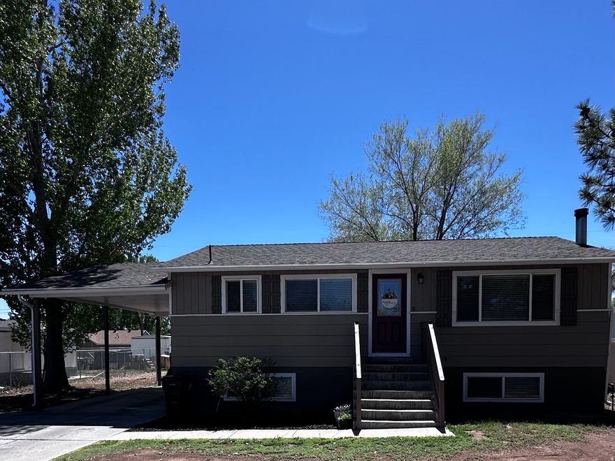 Charming rambler style house conveniently located in Roosevelt, Utah. Features 2 living rooms, eat in kitchen, 1 full bathroom, 3/4 bathroom, 4 bedrooms & full basement. The full walkout basement gives you extra space to spread out - perfect for guests, hobbies, or a second hangout area. The .17acre lot is shaded by mature trees, making the yard feel peaceful and inviting. You'll also appreciate the covered parking, especially during Utah winters. A solid home with tons of potential. Call the listing office or the awesome Realtor you are working with to come see your next home. Square footage figures are provided as a courtesy estimate only and were obtained from Duchesne County Tax Record.  Buyer is advised to obtain an independent measurement.