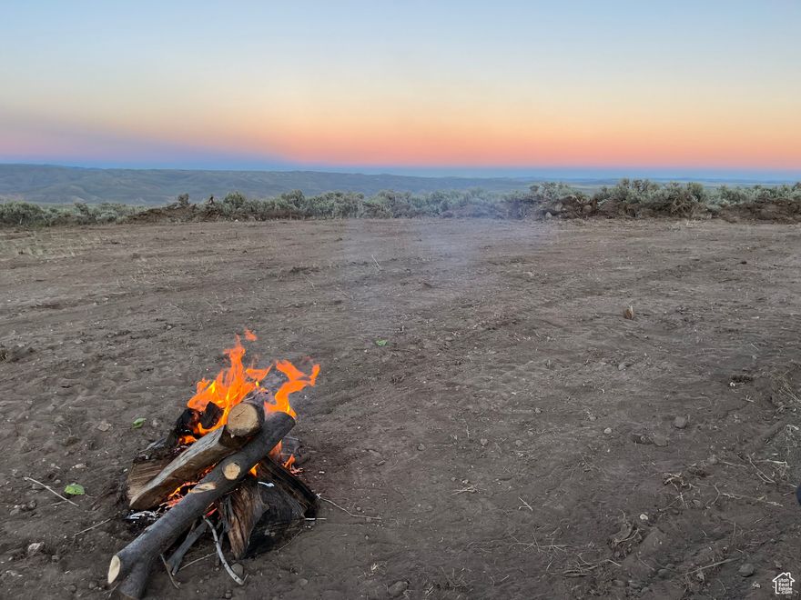 Price Adjustment! Your 40 Acre Bear Lake Getaway Awaits!! Get ready to soak in beautiful sunsets and sunrises stretching out over this spacious 40 acre lot, less than 3 miles as the crow flies from the NE edge of Bear Lake's waters. Sellers have improved the land with 9 flattened camper/RV parking spaces, and one big spot on the highest point, perfect for your future cabin! Enjoy plenty of wildlife and fresh air with the off-grid living here in Indian Creek! County does not plow roads in winter, but neighbor lives on lot 1/2 mile away year-round. Come build your dream summer Bear Lake cabin, or bring your camper whenever you can make it. Only a 15 minute drive to either Bear Lake's North Beach or East Beach! Get in on the growth of Bear Lake with this 40 acre piece on the east side for the same price you'd pay for an acre on the other side of the lake! Arrange showing with agent, as code is needed to get through gate. Final address TBD. Coordinates are: 42 07.245' N, 111 12.740' W. If using Google Maps, property is 1/2 mile north of home at 1294 Rattle Snake Ridge, Dingle, ID.