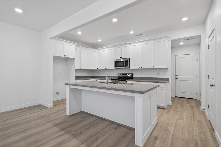 Nestled in the vibrant community of Herriman, Utah, this two-story townhome offers 3 bedrooms, 2.5 bathrooms, and a stylish, comfortable layout perfect for modern living. The main level features an open-concept design, where the living room flows effortlessly into the dining area and kitchen. The thoughtful layout makes the space ideal for both entertaining and everyday living. Upstairs, you'll find three bedrooms, including a loft area that provides the perfect spot for a home office, playroom, or additional lounge space. A conveniently located laundry room on the second floor adds to the home's practicality. This townhome features a two-car attached garage and is situated in a vibrant neighborhood near excellent schools, shopping, dining, and outdoor recreation. Offering a blend of modern living and everyday convenience, this Herriman home is ready to welcome you. Schedule a tour today to see it for yourself! Square footage figures are provided as a courtesy estimate only and were obtained from building plans. Buyer is advised to obtain an independent measurement.