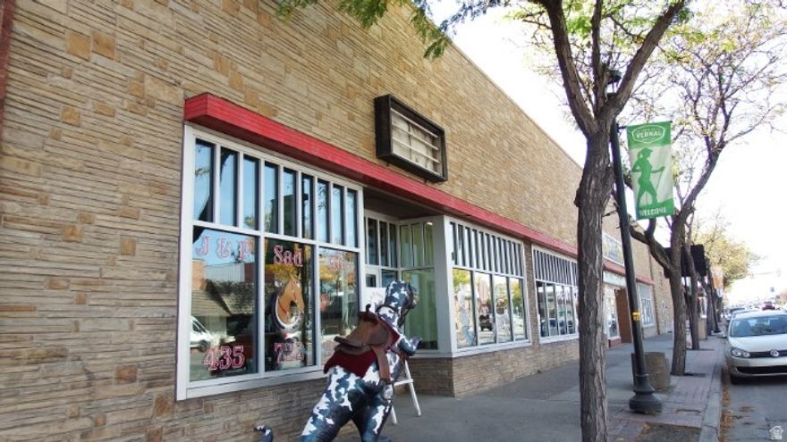 Fully occupied property in the heart of Vernal City, some units are residential apartments on second level. 4/5 of roof new in 2020, newer windows, Newer AC and Sewer lines.