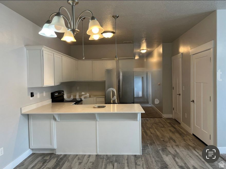 Welcome to Your Perfect Lehi Condo! Discover this beautiful 3-bedroom, 2-bathroom main floor condo with a 1-car garage, perfectly situated close to everything - Costco, Primary Children's Hospital, and all the best that Lehi has to offer. Located in The Exchange,  master-planned community featuring condos, townhomes, cottages, and single-family homes in the heart of this sought-after city. You'll love being just minutes from Silicon Slopes, the I-15 corridor, Thanksgiving Point, The Outlets at Traverse Mountain, and endless dining and shopping options. Beyond the amazing location, this family-friendly community offers incredible amenities: a pool, clubhouse, fitness center, playgrounds, picnic areas, and sports courts - all designed to make every day feel like a getaway. Don't miss out on this prime opportunity to own a low maintenance, income producing property in one of Lehi's most desirable neighborhoods! Currently tenant occupied!